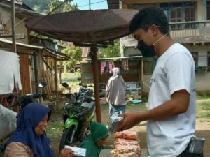 Cegah Covid-19, Relawan Gerak Muda Bersama BPD Kanrung Membagikan Masker Flyer
