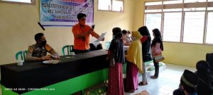 Bhabinkamtibmas Polsek Bulukumpa Amankan Pembagian Bantuan Sosial Tunai (BST) Tahap III