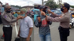 Polsek Bulukumpa Tertibkan Penggunaan Masker Pedangang dan Pengunjung Pasar Rakyat Tanete