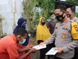 Kapolres Labuhanbatu Bergerak Bantu Korban Kebakaran