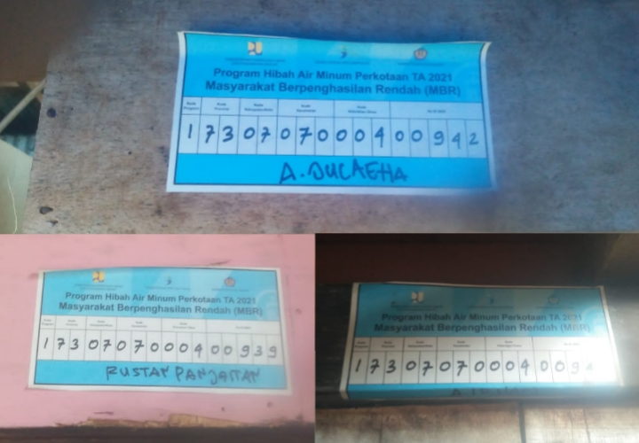 Foto label penerima Program Hibah Air Perkotaan Tahun 2021 di Kabupaten Sinjai